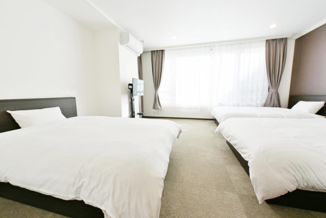 Hostel Pleasure Maruyama Sapporo Bagian luar foto