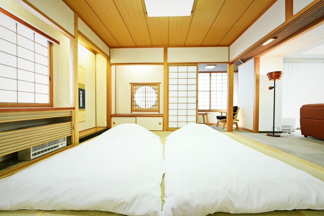 Hostel Pleasure Maruyama Sapporo Bagian luar foto